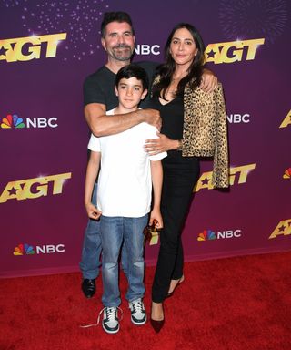 Simon Cowell, Eric Cowell and Lauren Silverman at an awards premiere