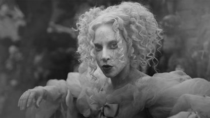 Lady Gaga dressed as a creepy doll in the music video for The Dead Dance