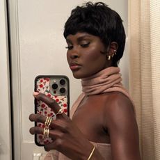 Photo of Amy Julliette Lefévre taking a mirror selfie