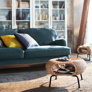 living room with cane table and couch