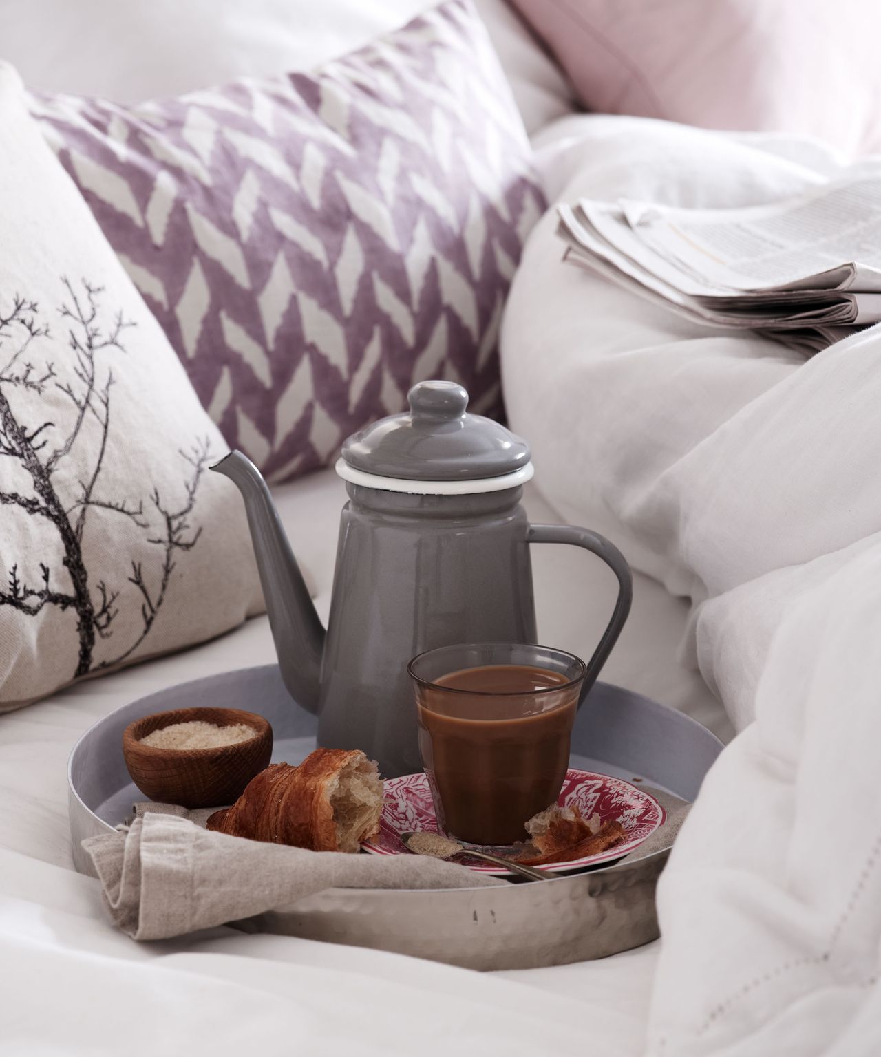 coffee and croissant in bed