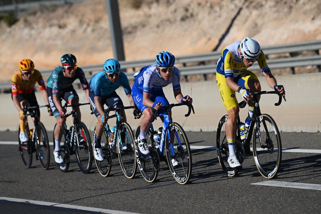 SAGUNTO SPAIN FEBRUARY 03 A general view of Jonas Gregaard of Denmark and UnoX Pro Cycling Team Bob Jungels of Luxembourg and Team BORA Hansgrohe Simone Velasco of Italy and Astana Qazaqstan Team Lawson Craddock of The United States and Team Jayco Alula and Sander De Pestel of Belgium and Team Flanders Baloise compete in the breakaway during the 74th Volta a la Comunitat Valenciana 2023 Stage 3 a 1451km stage from Btera to Sagunto VCV2023 VoltaValenciana on February 03 2023 in Sagunto Spain Photo by Dario BelingheriGetty Images