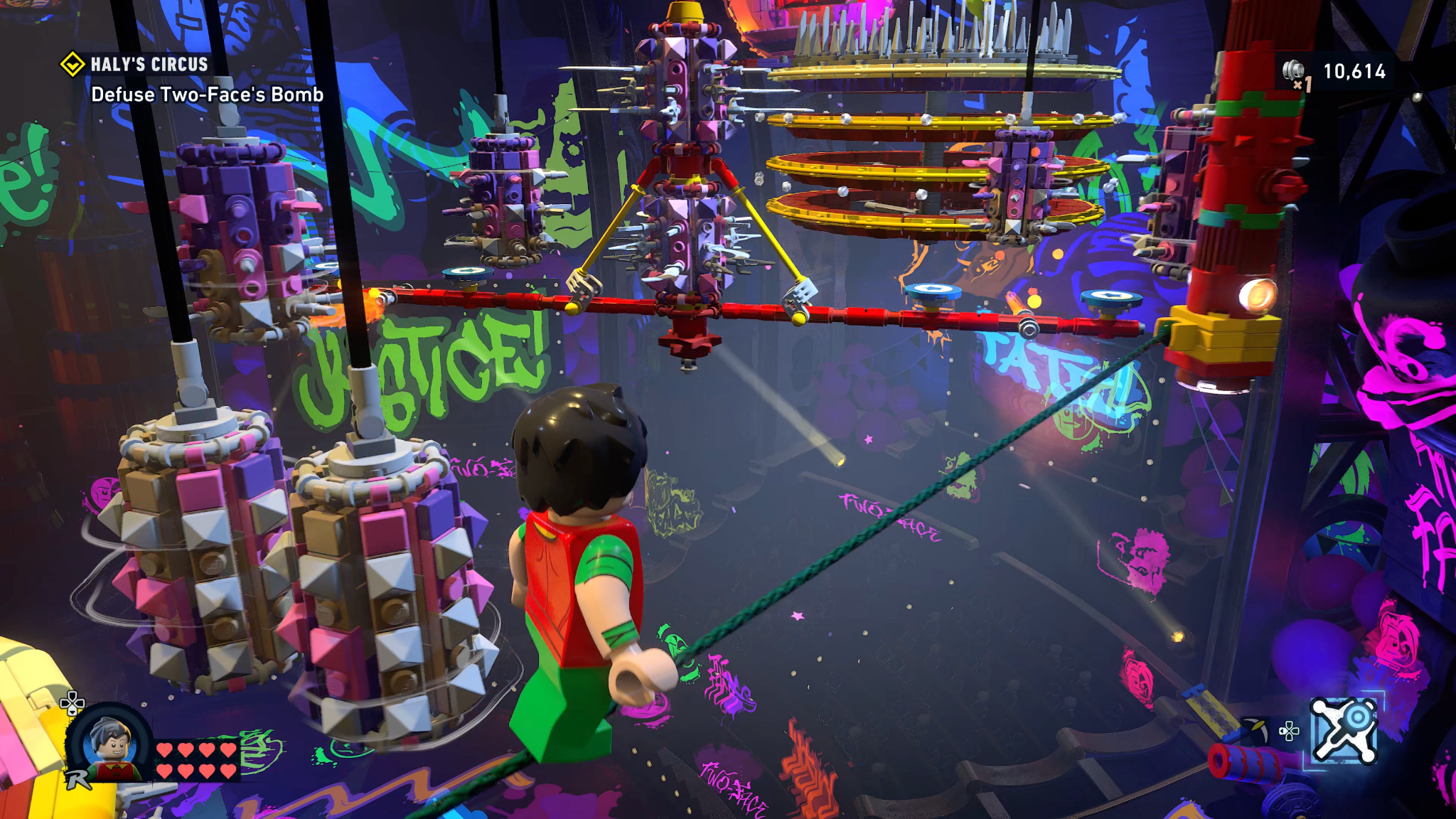 Robin walking a tightrope in Lego Batman: Legacy of the Dark Knight