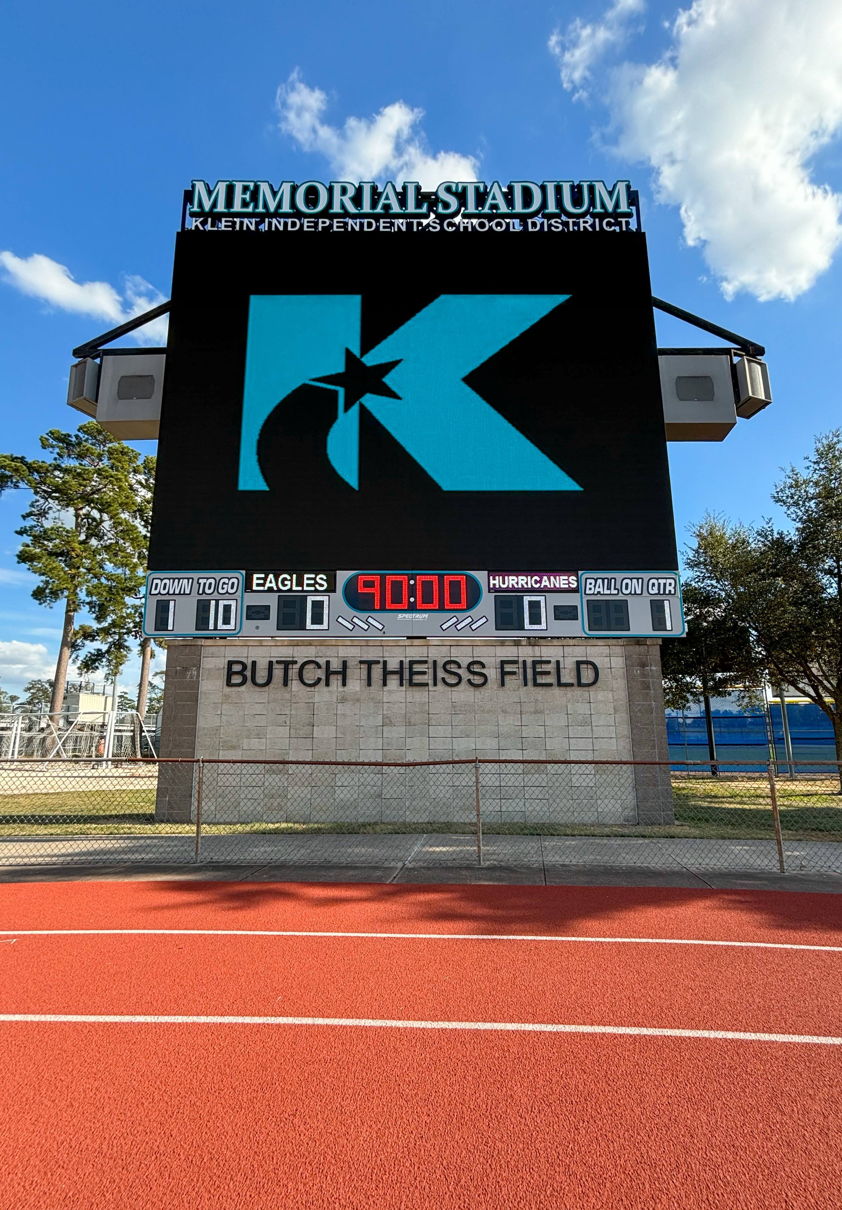 Two different digital scoreboards for high school football.