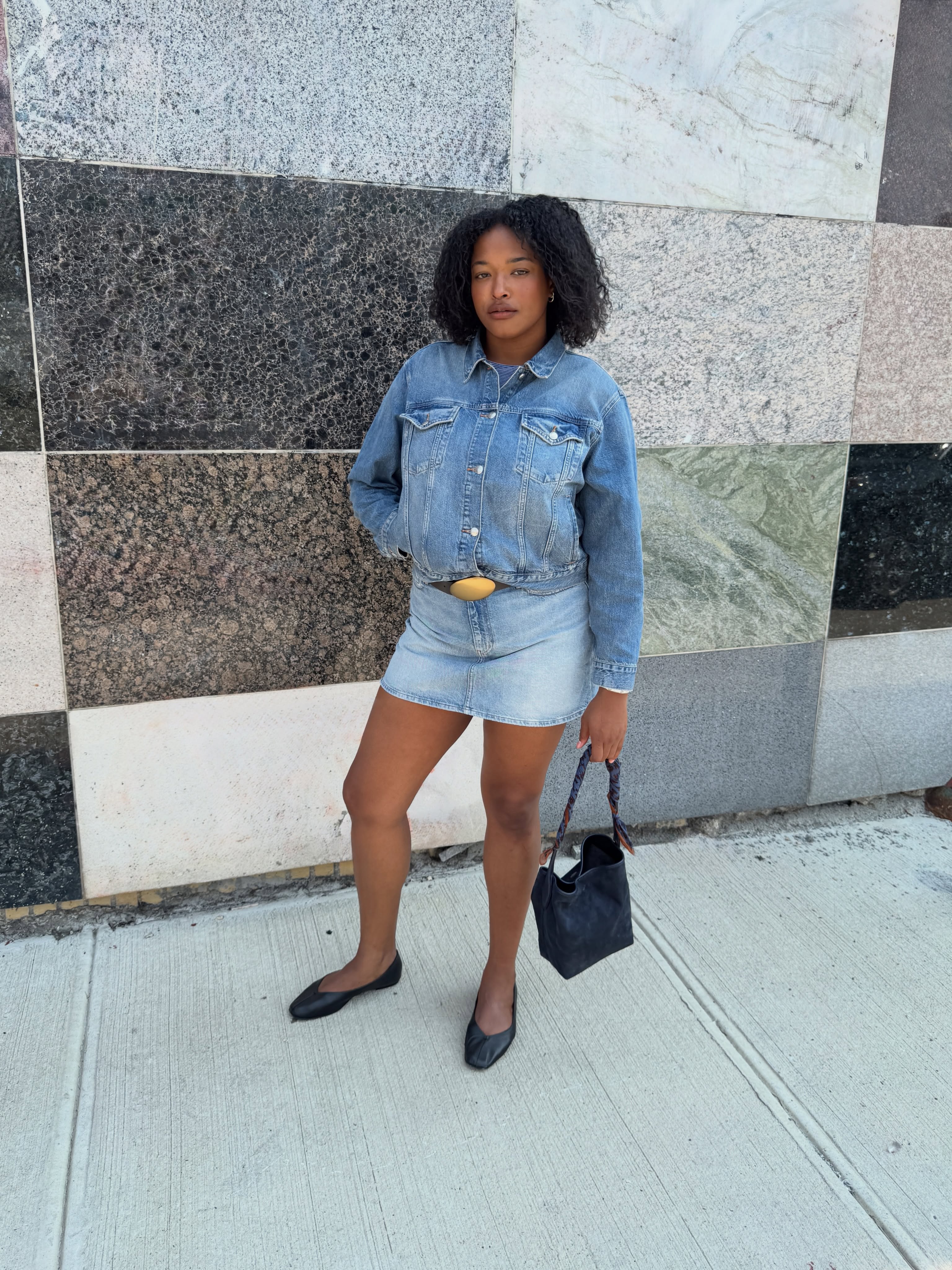 An image of a woman wearing early fall trendy outfit idea 2026