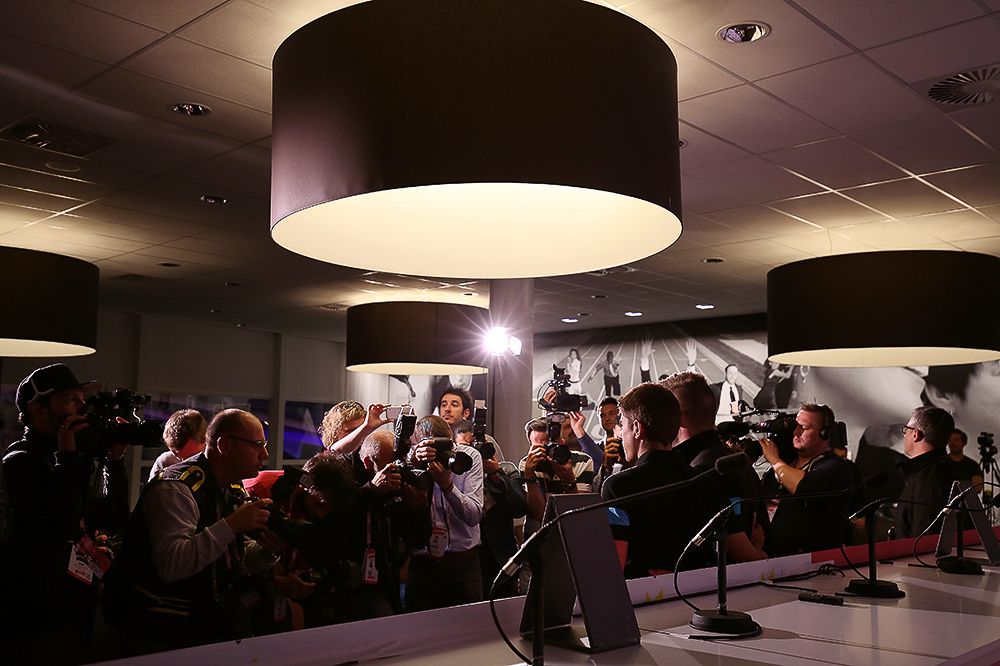 Lights! Camera! Action! Team Sky riders pose for photos at Wednesday's press conference.