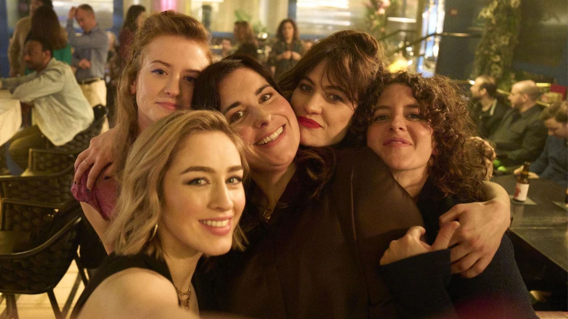 The sisters take a selfie in a bar