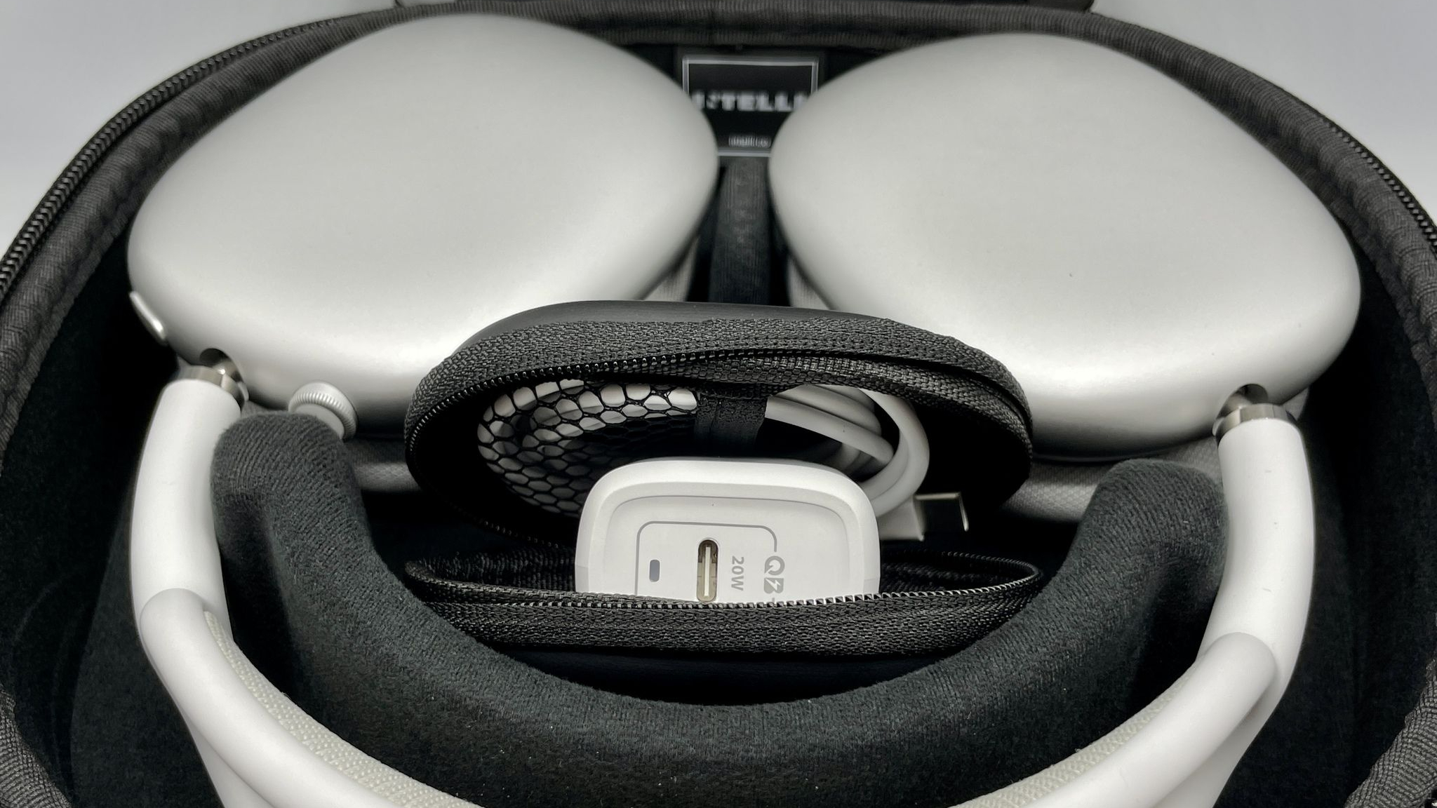 Intelli Carryon case for AirPods Max in use.