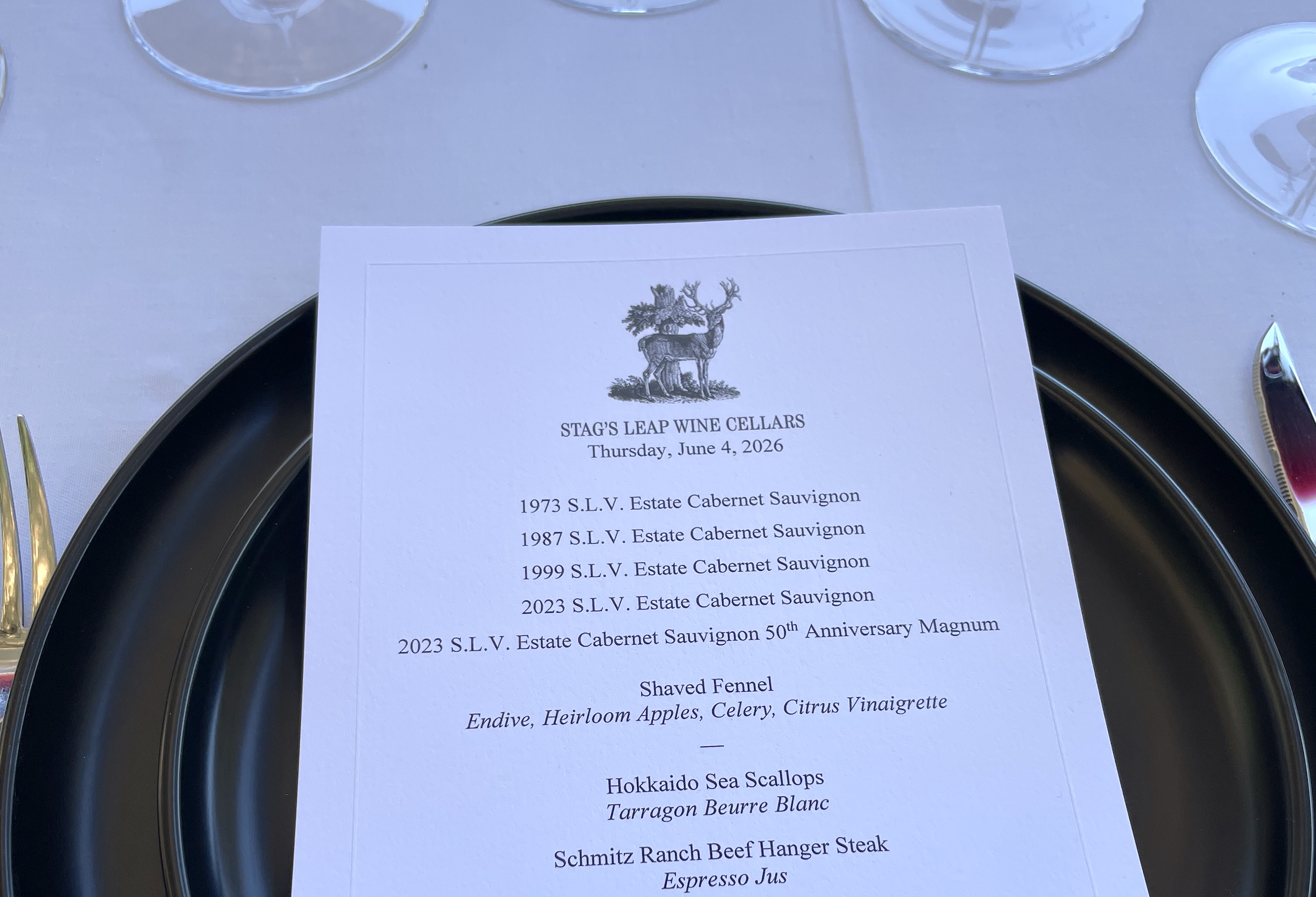 A photo of the menu and table setting from a lunch at which the 1973 Stag's Leap Wine Cellars S.L.V. Cabernet Sauvignon was poured