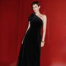 model wearing black me+em one shoulder dress