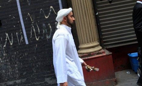 A man walks into Friday prayers in the building that is the proposed site of the Park51 mosque and cultural center, which is blocks from Ground Zero in New York City. 