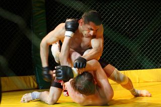 Fight in championship of Russia of mixed fighting single combats, July 2, 2009 in Tomsk, Russia.