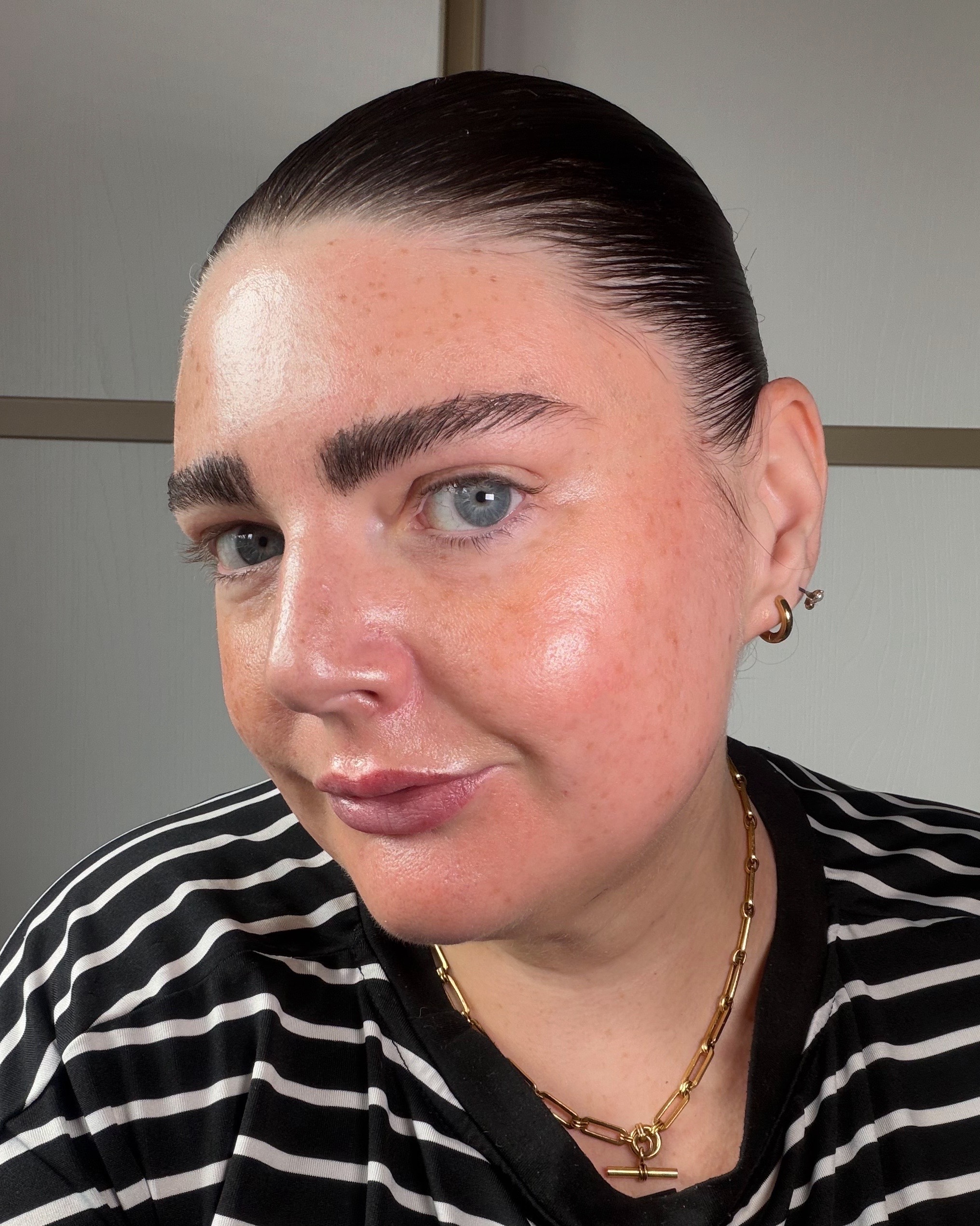 after application of Rhode Highlight Milk 02 Pearly Champagne