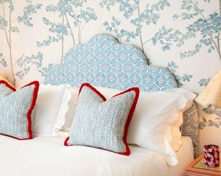 Aller Dorset blue and white shapely headboard with blue and white wallpaper