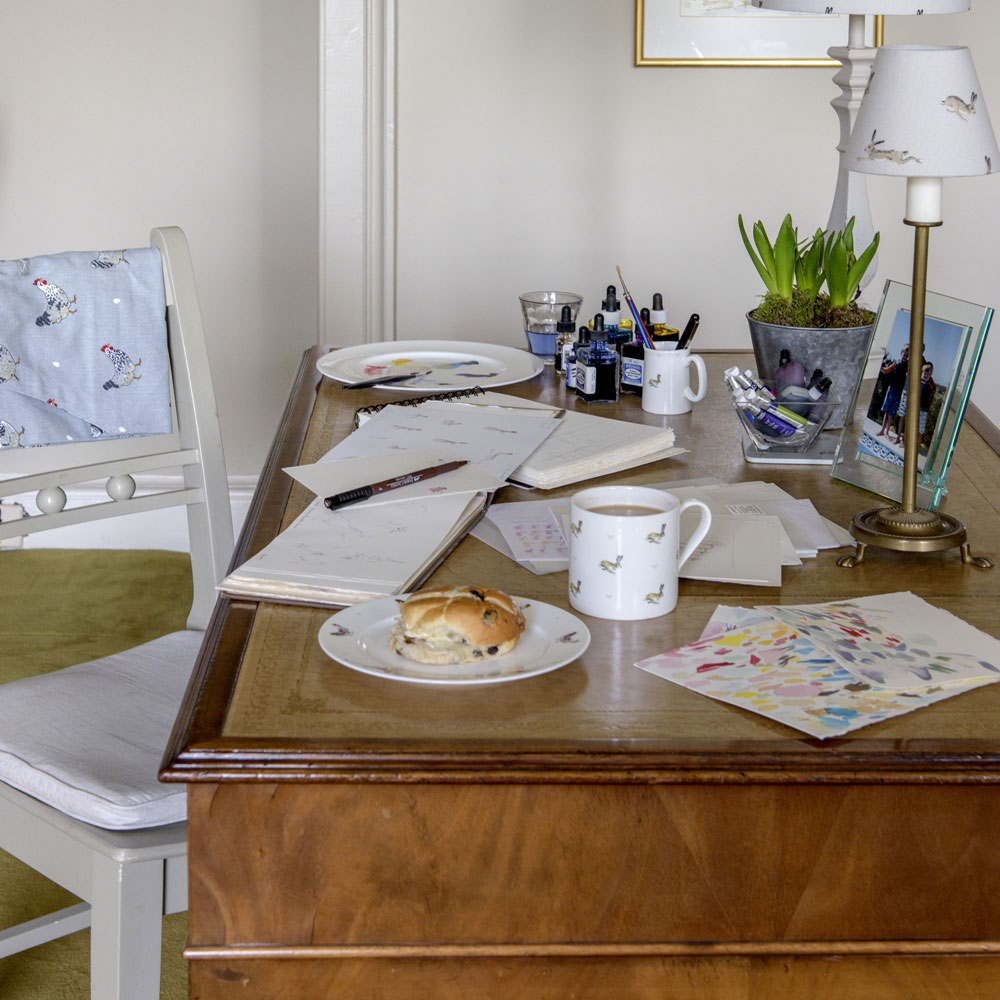 white study room with table and plant