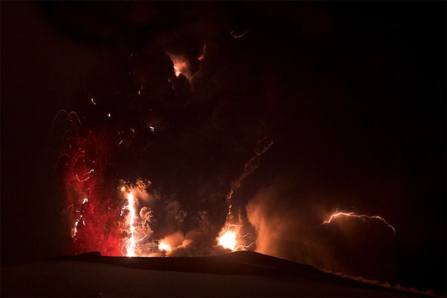 Jagged lines of lightning electrify the ash plume