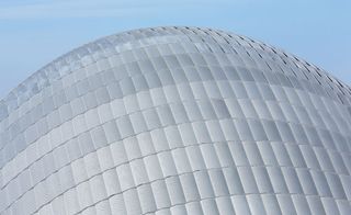 Jérôme Seydoux-Pathé Foundation: The roof's curved shape is covered in perforated aluminium scales