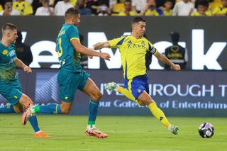 Nassr's Portuguese forward #07 Cristiano Ronaldo attempts a shot on goal during the Saudi Pro League football match between Al-Nassr and Al-Orobah at Al-Awwal Park in Riyadh on October 5, 2024. (Photo by Fayez NURELDINE / AFP) (Photo by FAYEZ NURELDINE/AFP via Getty Images)