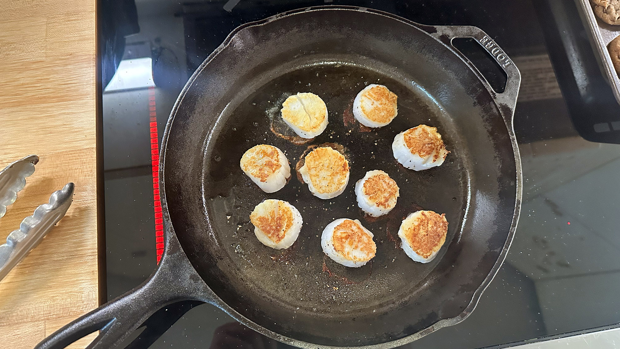 searing scallops on the Copper Charlie
