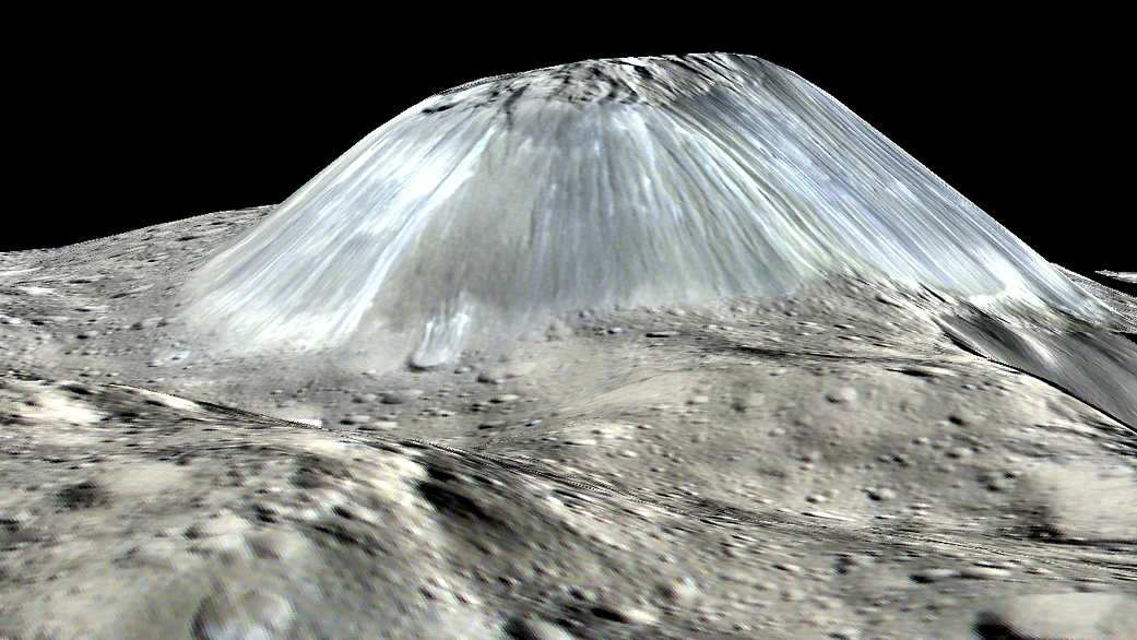 New work suggests that dwarf planet Ceres&#039; biggest mountain, Ahuna Mons, may have formed after a muddy slurry erupted. This image shows a side view of Ahuna Mons, which is 2.5 miles tall and 10.5 miles wide (4 by 17 kilometers). Ahuna Mons has a dome shape that resembles that of mountains created on Earth by volcanism. However, unlike volcanoes on Earth, Ahuna Mons was created by a volcano spewing cold, molten ice rather than hot, liquid rock.