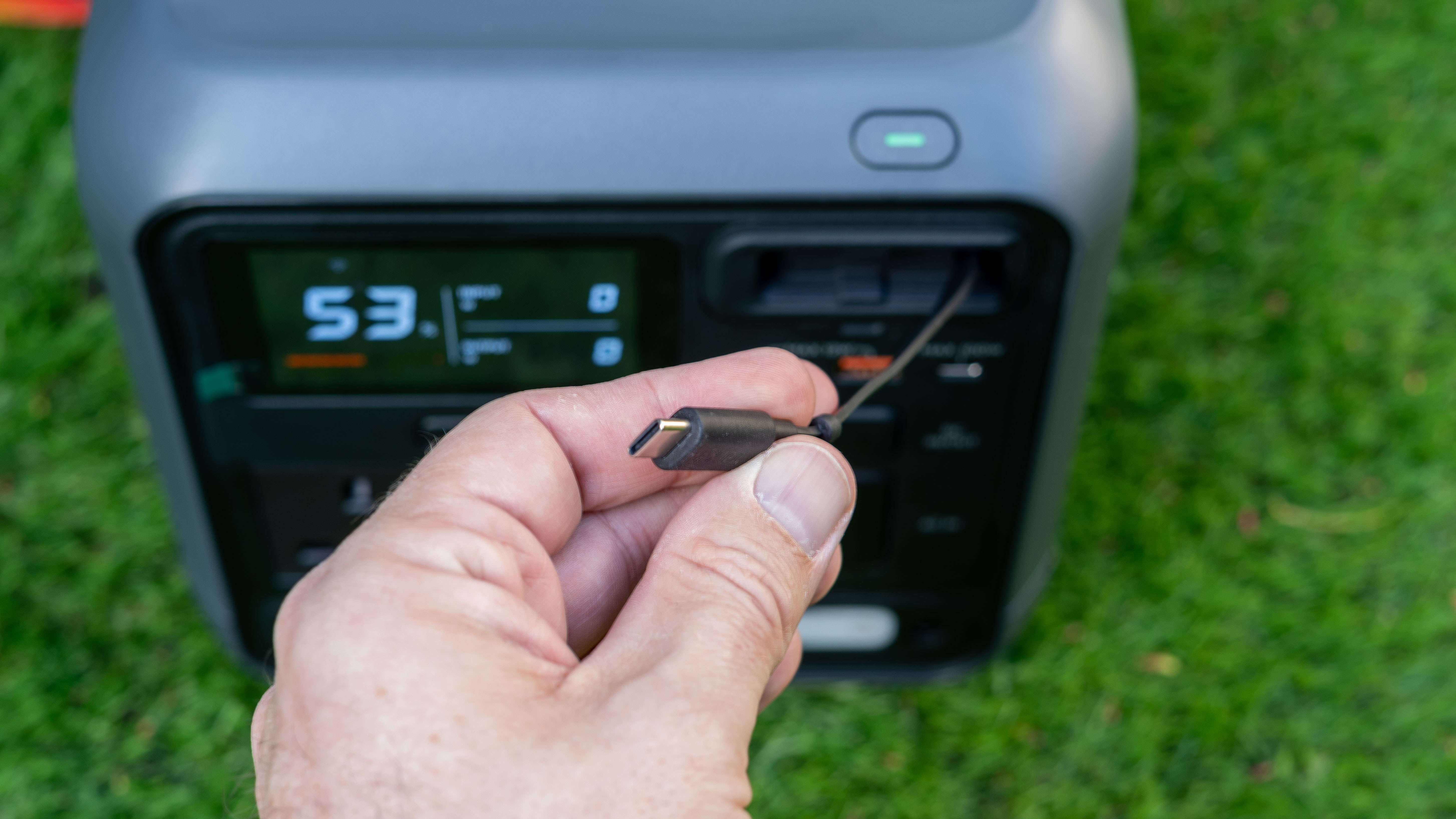 Pull out USB-C cable in hand from DJI Power 1000 Mini