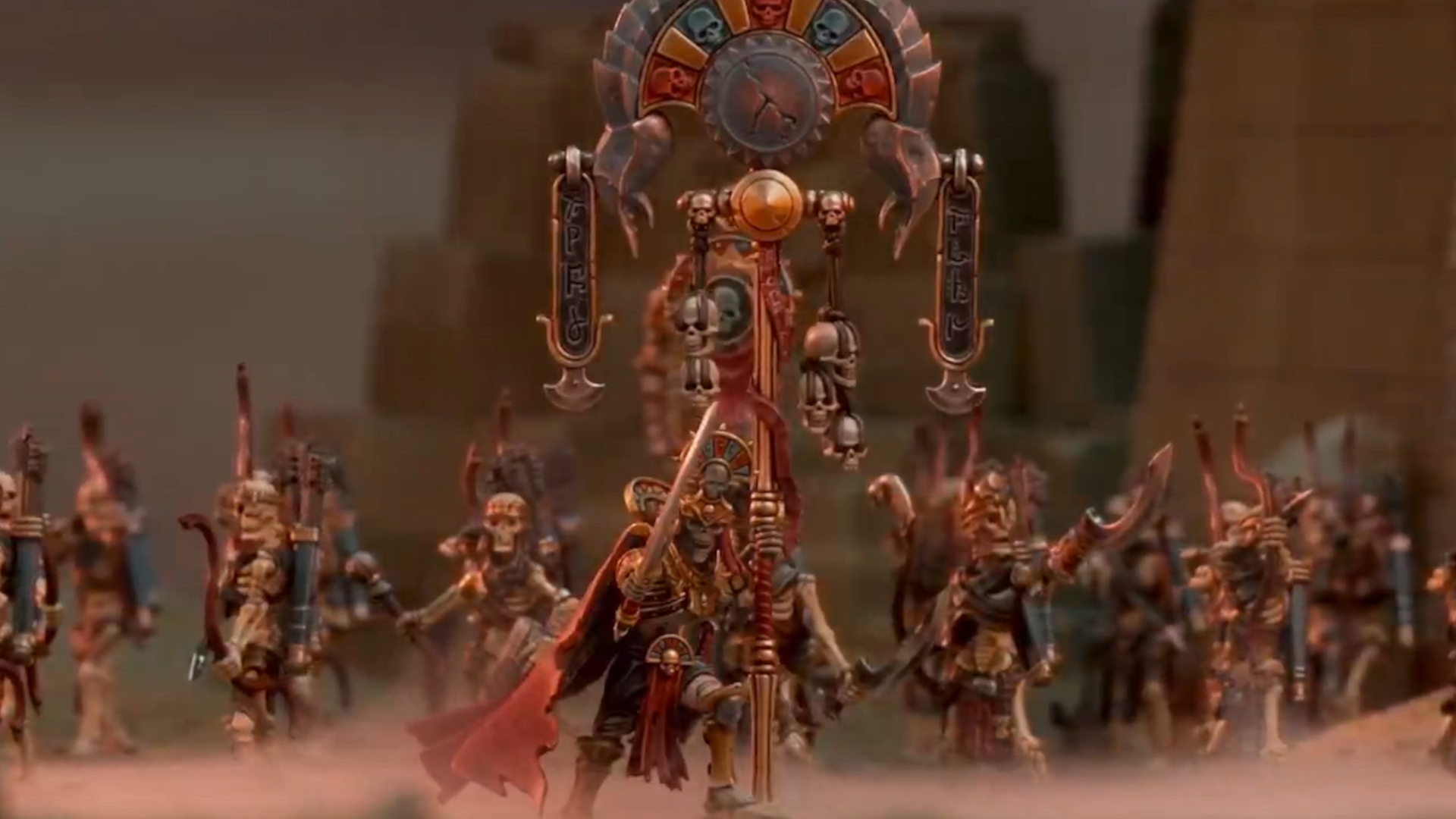 Warhammer Tomb Kings models aiming bows and swords on a desert battlefield