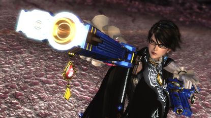 In Bayonetta 2 on the Wii U, protagonist Bayonetta wields two pistols and adopts a fierce stance, poised to shoot 