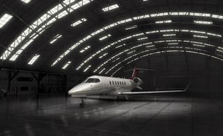 The Bombardier Learjet with dark lights