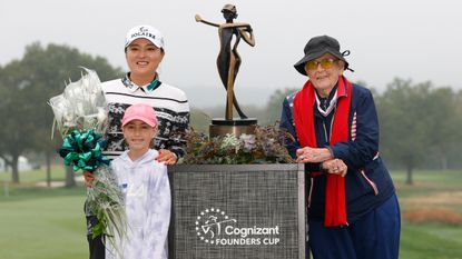 Shirley Spork at the 2021 Cognizant Founders Cup alongside winner Jin Young Ko and LPGA-USGA Girls Golf member Sofia Riccobono