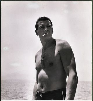 rock hudson, another shot of the magnificent rock hudson smoking on the beach undated publicity photo
