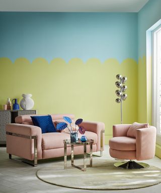 A contemporary living room with scalloped wall paint decor in sky blue and lime green