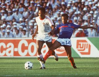 France midfielder Jean Tigana makes an interception against Portugal in the semi-finals of Euro 1984.