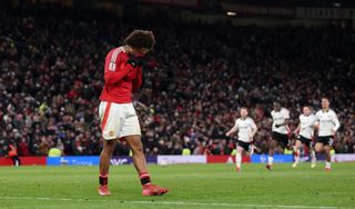 Joshua Zirkzee looks dejected after missing his penalty in the FA Cup shootout defeat against Fulham