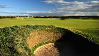 A close up of a bunker on a links course