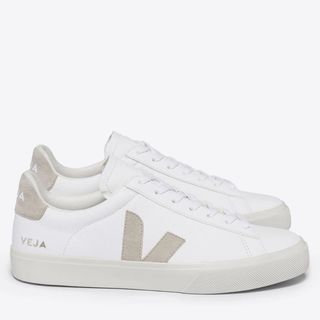 Flat lay image of white Veja trainers