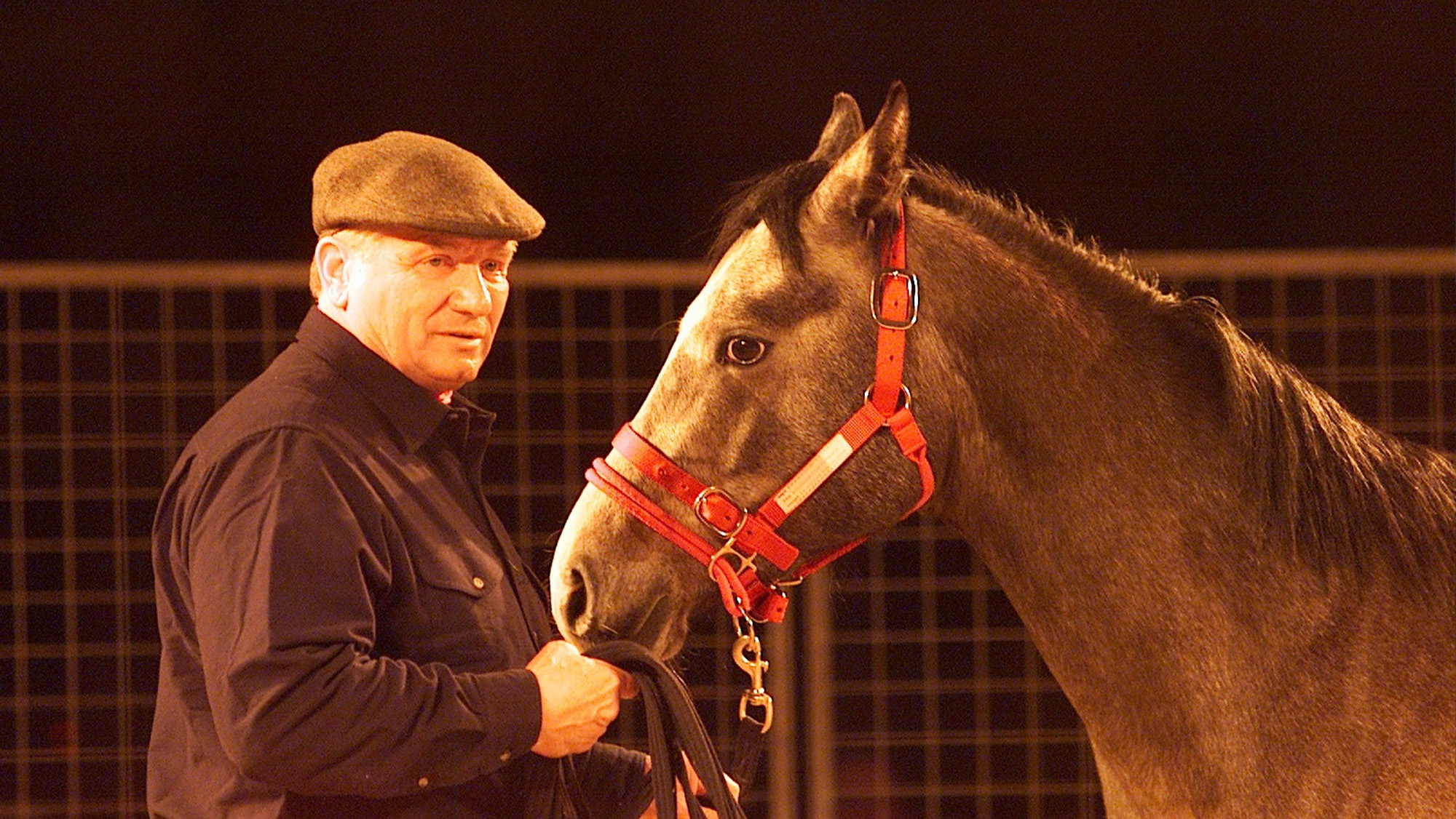 Monty Roberts with a horse at a demonstration in 2002