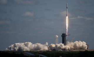 A Russian has launched to orbit with SpaceX for the first time.