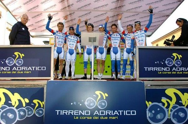 Gianni Savio's Diquigiovanni team on the stage prior to the start of Tirreno-Adriatico stage one.