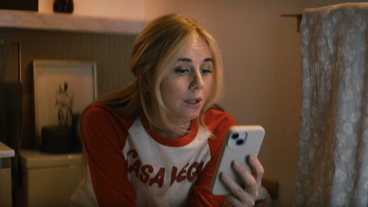 Morgan talking into her phone in Nobody Wants This.