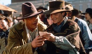 Back To The Future Part III Doc and Marty checking a photograph in the old west