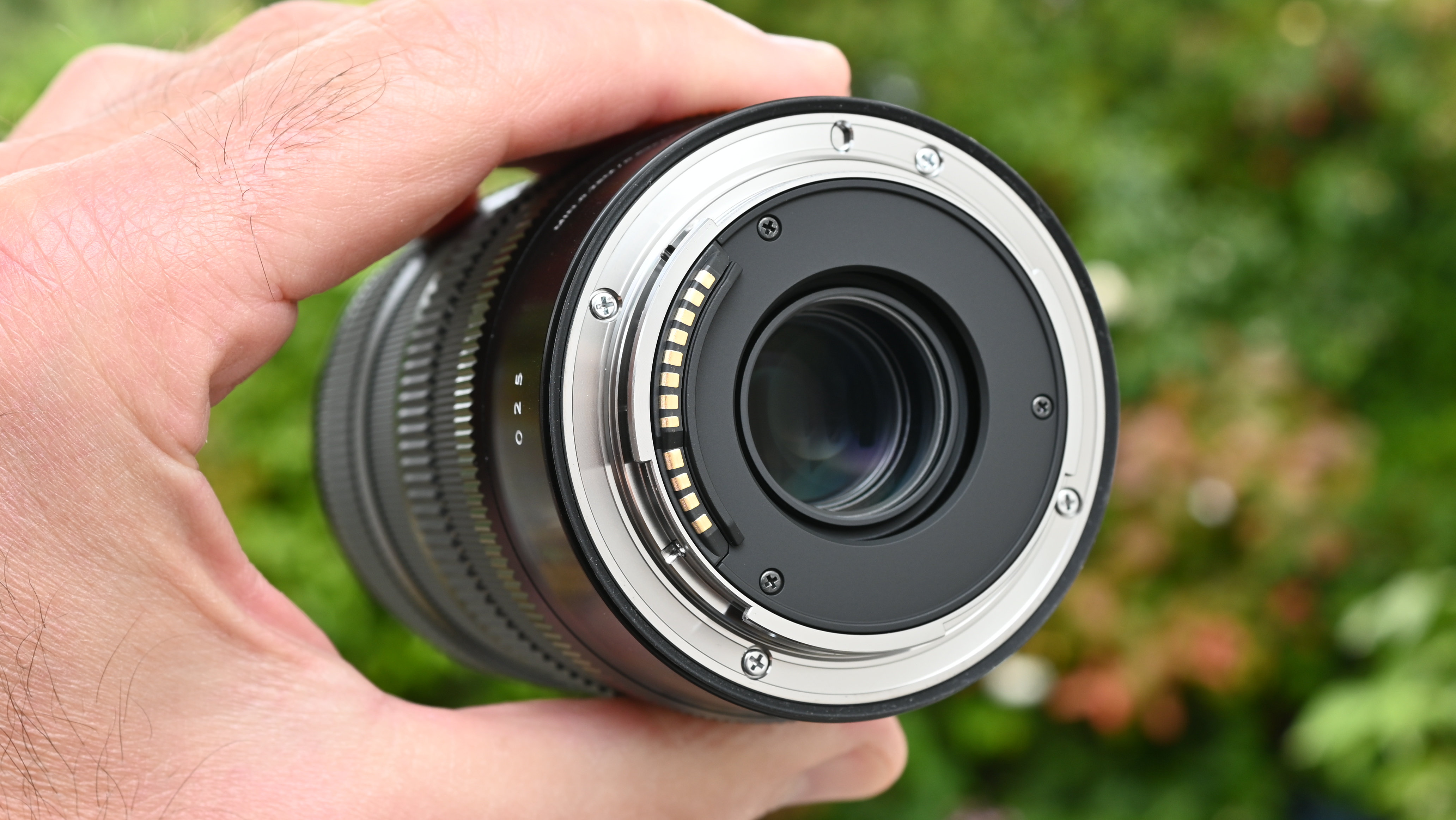 Sigma 17-40mm f/1.8 DC | A product shot held in hand