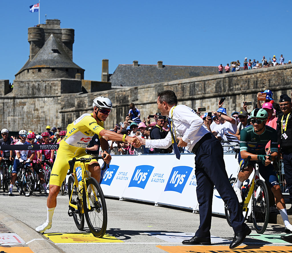SAINT-MALO, FRANCE - JULY 11: (L-R) Mathieu van der Poel of Netherlands and Team Alpecin - Deceuninck - Yellow Leader Jersey and David Lappartient, President of the UCI World Tour prior to the 112th Tour de France, Stage 7 a 197km stage from Saint-Malo to Mur-de-Bretagne (Guerledan) / #UCIWT / on July 11, 2025 in Saint-Malo, France. (Photo by Dario Belingheri/Getty Images)