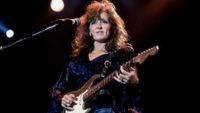American blues musician Bonnie Raitt performs onstage at Farm Aid in the Hoosier Dome, Indianapolis, Indiana, April 7, 1990.