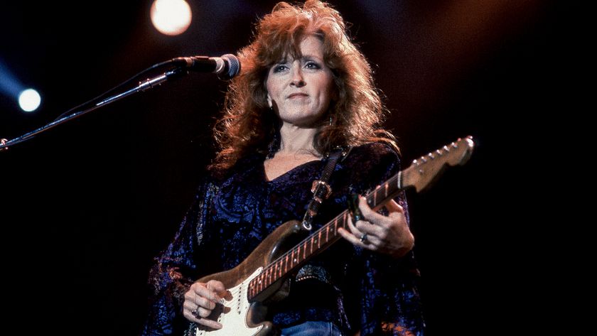American blues musician Bonnie Raitt performs onstage at Farm Aid in the Hoosier Dome, Indianapolis, Indiana, April 7, 1990. 