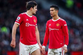 Harry Maguire and Cristiano Ronaldo of Manchester United during the Premier League match between Manchester United and Crystal Palace at Old Trafford on December 5, 2021 in Manchester, England. (Photo by Robbie Jay Barratt - AMA/Getty Images)