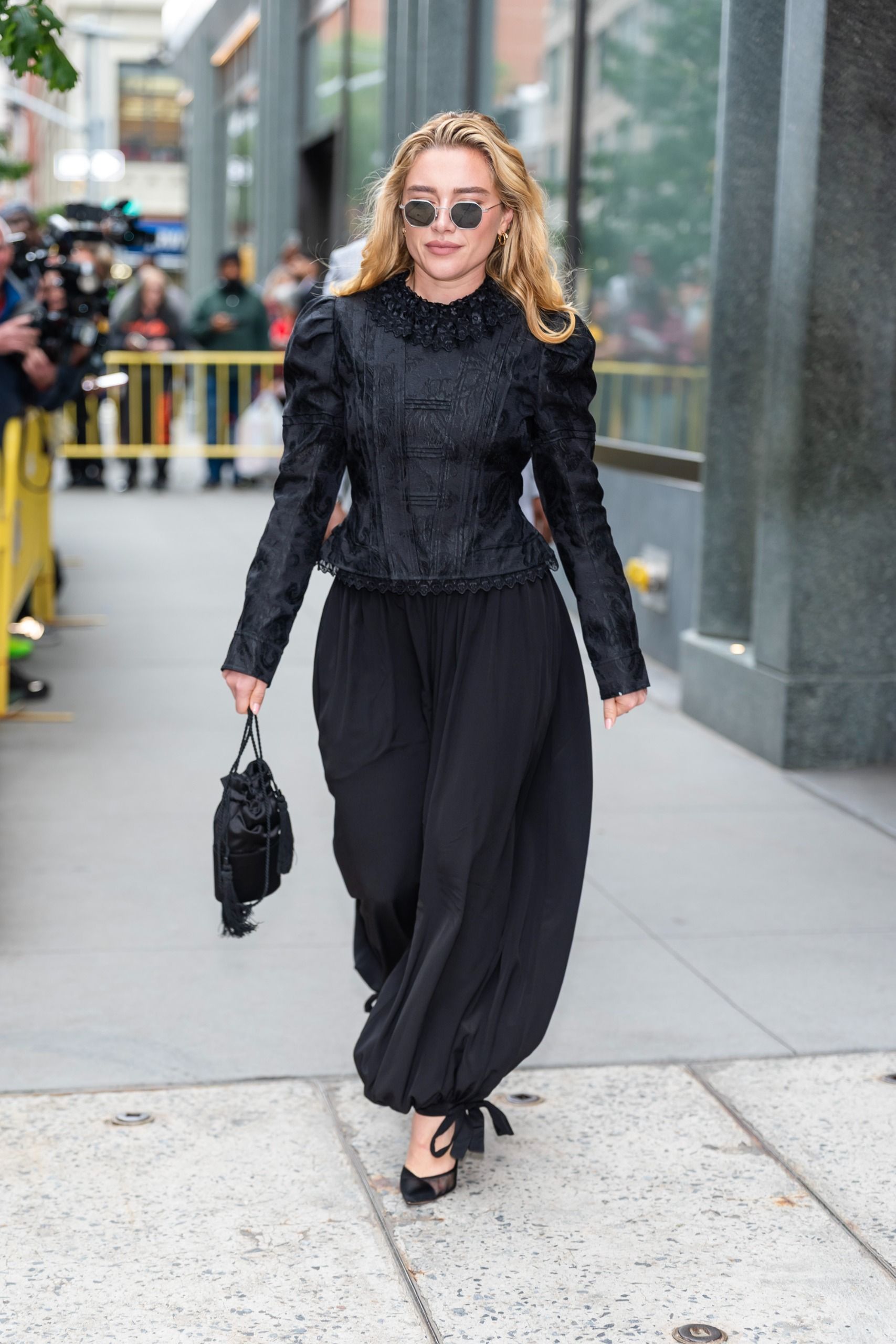 fall winter trends worn by London girls: Florence Pugh's balloon pants