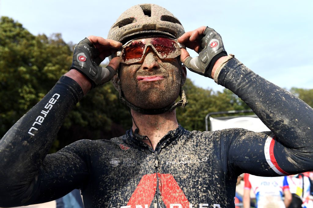 ROUBAIX FRANCE OCTOBER 03 Michal Golas of Poland and Team INEOS Grenadiers covered in mud after the 118th ParisRoubaix 2021 Mens Eilte a 2577km race from Compigne to Roubaix ParisRoubaix on October 03 2021 in Roubaix France Photo by Tim de WaeleGetty Images