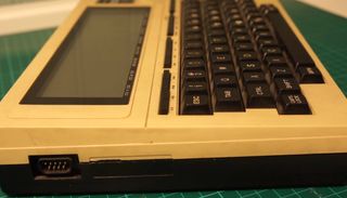Old plastic TRS-80 that's turned yellow.