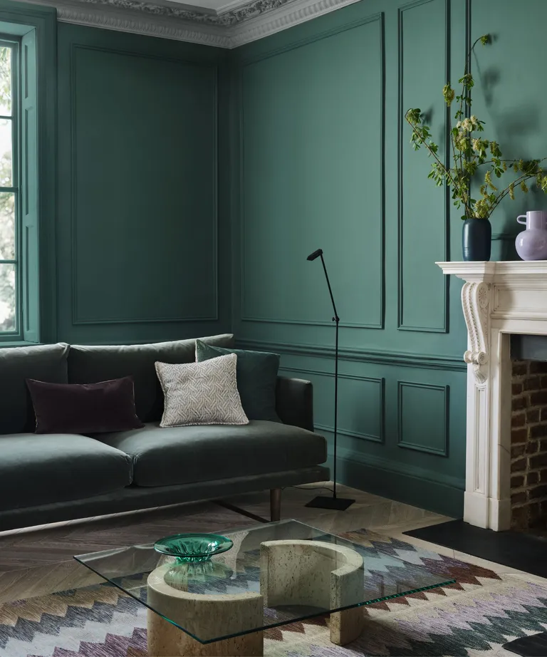 Green walls, white ceiling and fireplace
