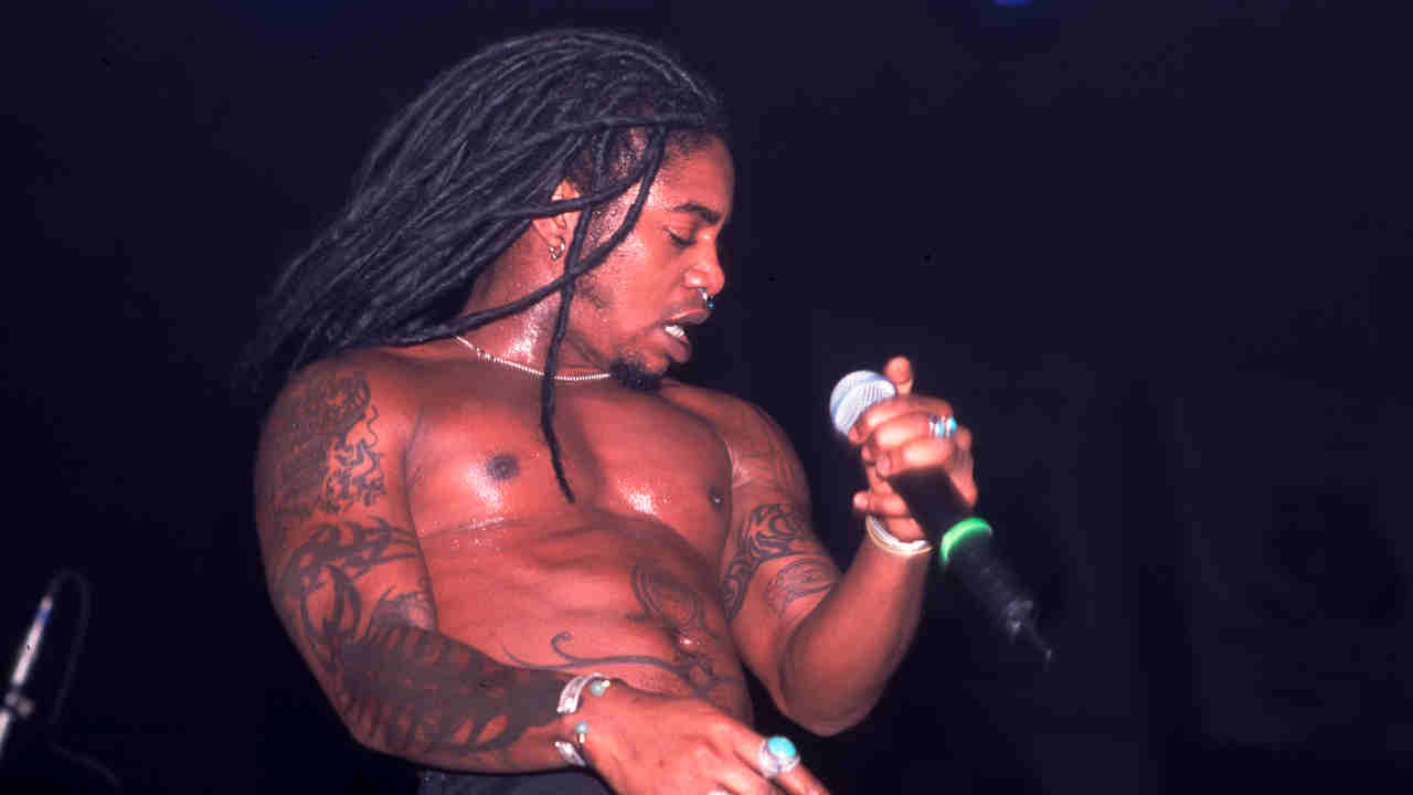 Sevendust&amp;rsquo;s Lajon Witherspoon performing onstage in the early 2000s